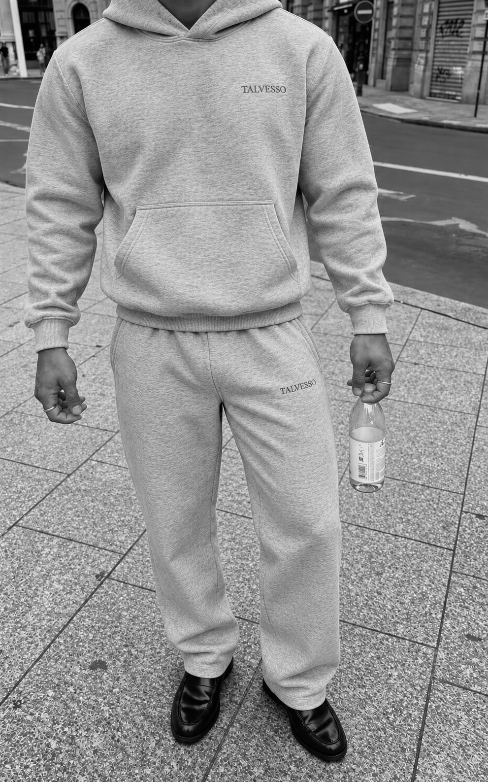 Close-up of the grey TALVESSO hoodie and sweatpants